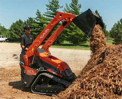 mini skid steer on tracks|stand behind mini skid steer.